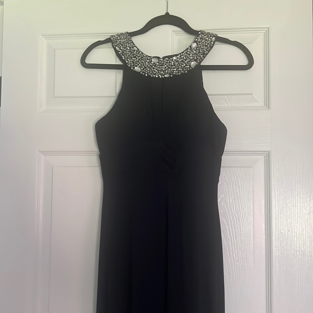 This is in mint condition. Worn once. Can be won for prom or wedding.